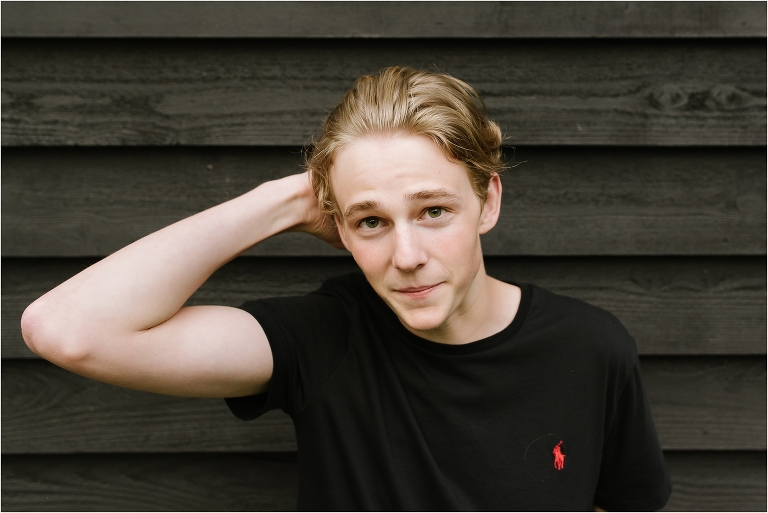 teen boy running hand through hair - high school senior portrait - Bainbridge Island Photographer