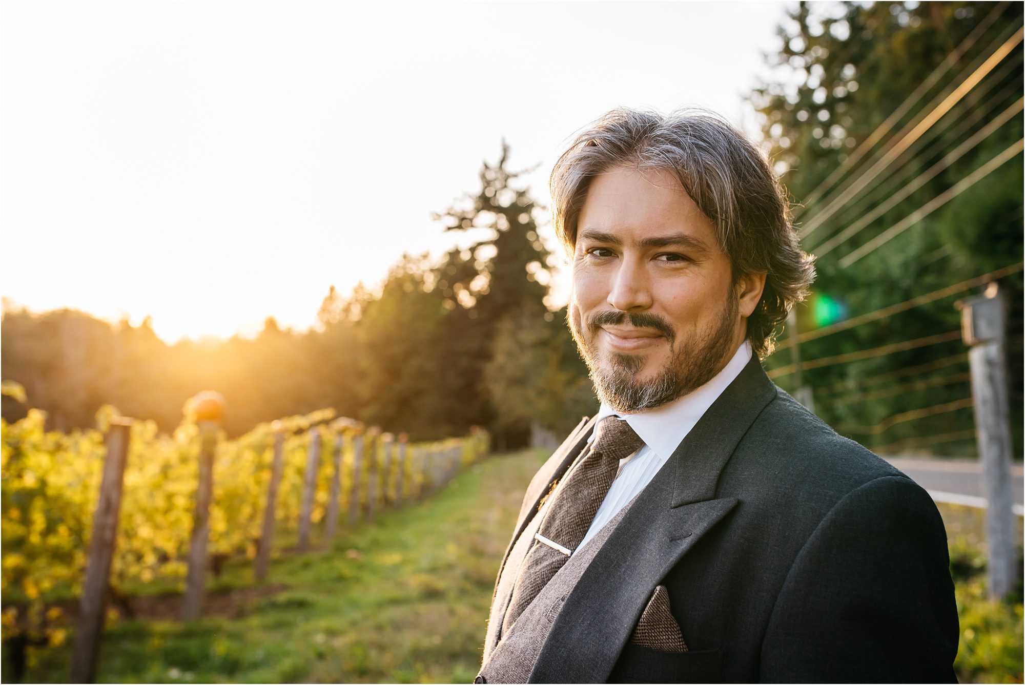 portrait of man wearing tuxedo in field